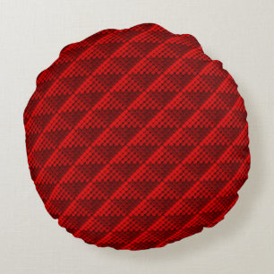Repetition of red circles forming geometric shapes round cushion