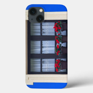 Residential housing with flowers in windows iPhone 13 case