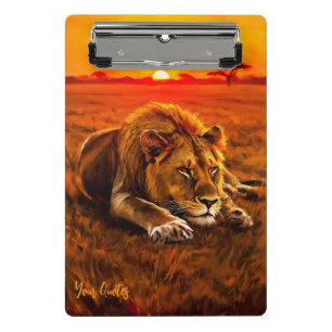 Resting Male Lion on Golden Savanna Mini Clipboard