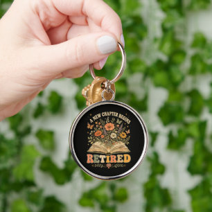 Retired A New Chapter Begins Retro Floral Book Key Ring