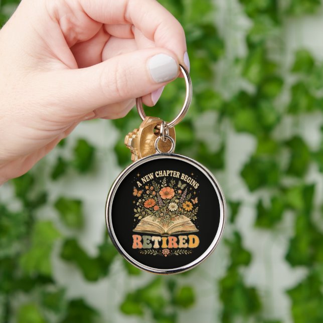 Retired A New Chapter Begins Retro Floral Book Key Ring (Hand)