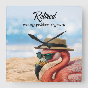 Retired Flamingo on Beach with Hat & Sunglasses Square Wall Clock