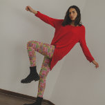 Retro 1970s Collage of Christmas Words Patterned Leggings<br><div class="desc">Add a vintage touch to your Christmas look this year with these retro style leggings. They feature a collage of Christmas greetings and sayings in a seventies style colour palette of pink,  orange,  red,  green and lime green.</div>