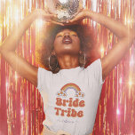 Retro 70s Bride Tribe Bridesmaid Name Bachelorette T-Shirt<br><div class="desc">Have fun at bachelorette party with this cool t-shirt,  featuring retro rainbow,  daisy,  font & custom text of your choice. Easily add your own details by clicking on the "personalise" this template option.</div>