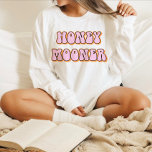 Retro 70's Themed Honeymooner Bride T-Shirt<br><div class="desc">Honeymooner bride t shirt featuring a retro 70's themed font with retro pink orange colouring. This shirt makes the perfect gift for a bride-to-be, bridal shower or bachelorette weekend celebration so she can wear it on her honeymoon. Colours are editable! Click 'edit design' to create your own colours. ©Marisu Valencia...</div>