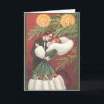 Retro Arto Deco Christmas Greeting Card<br><div class="desc">Vintage / Retro Christmas greeting card.  Lovely couple in a loving embrace in front of a Christmas tree!</div>