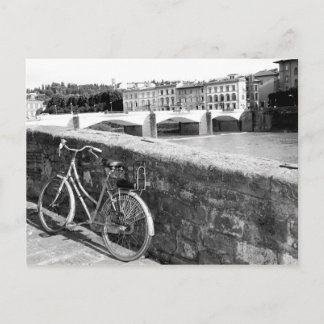 Retro Bicycle next to a bridge in Florence Postcard