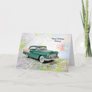 retro car on road map card