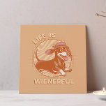 Retro Dachshund 'Life is Wienerful' Wall Art Print<br><div class="desc">Bring a touch of whimsy to your home with this Retro Dachshund 'Life is Wienerful' Graphic Faux Wrapped Canvas Art Print. This fun and quirky design features an adorable dachshund, complete with a cute fedora hat, perfectly capturing the essence of retro charm. The muted colours of terracotta and orange give...</div>