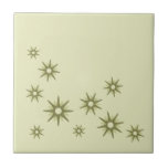 Retro Green Starburst Design Ceramic Tile<br><div class="desc">Mid-century modern inspired design featuring vintage retro green starbursts in an organic design on a lighter green background. Simple,  clean modern design.</div>