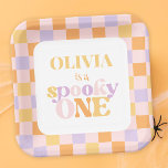 Retro Groovy Halloween First Birthday Paper Plate<br><div class="desc">This custom first birthday party plate features a colourful pastel chequered design that perfectly capture the excitement and fun of a 1st birthday celebration. It features a retro-inspired aesthetic and the phrase "spooky one" for a halloween themed birthday party.
Mockup picture by freepik.</div>