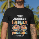 Retro palm trees sunglasses groovy family vacation T-Shirt<br><div class="desc">Get ready to groove in style with this customisable family vacation t-shirt! Embrace the sun-soaked vibes with a vibrant sunglasses illustration, accompanied by swaying palm trees. The caption "family vacation" pops in a colourful retro font, adding a touch of nostalgia to your getaway. Personalise it with your family name and...</div>