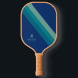 Retro Personalised Name Blue Teal Stripe Pickleball Paddle<br><div class="desc">Pickleball Paddle with Chic Retro Stripes Design in Trendy Boho navy blue, turquoise, teal, and aqua blue stripes with a subtle monogram initial personalisation in the corner. All colours and fonts are editable so you can design your own retro stripe pickleball paddle in team colours, favourite colours, or to match...</div>