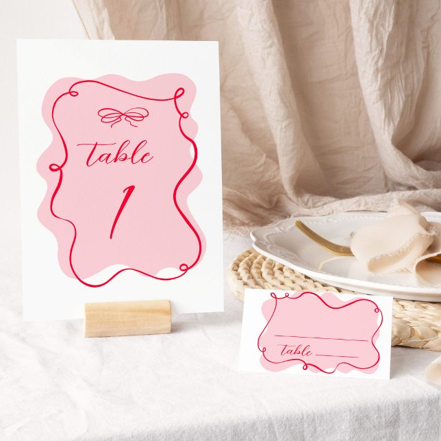 Retro pink and red wavy frame wedding table number (Creator Uploaded)