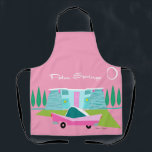 Retro Pink Palm Springs All-Over Print Apron<br><div class="desc">Between the pink background, turquoise mid century modern home, and the classic 1950s car, this design couldn’t be more Palm Springs if it said it in the clouds. Oh, wait, it does say it in the clouds! The blue and teal stone of the house is offset by the sputnik light...</div>
