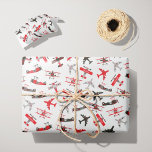 Retro Red and Black WWII Military Airplane Pattern Wrapping Paper<br><div class="desc">Wrap your little airman's presents with this retro plane wrapping paper. Wrapping paper features red and black vintage airplanes in a pattern. Personalize the wrapping paper with your young boy's first name, which fits on several of the aircraft wings. This wrapping paper is perfect for anyone who loves flying, airplanes,...</div>