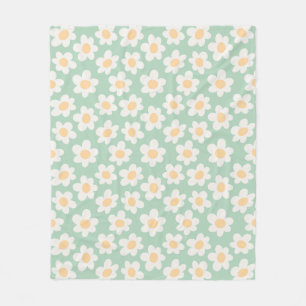 Retro style daisies in bloom on green background fleece blanket