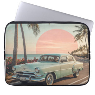 Retro-style vintage car on a coastal road  laptop sleeve