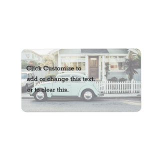 Retro Themed, A Retro Car Parked Out Side A House Label