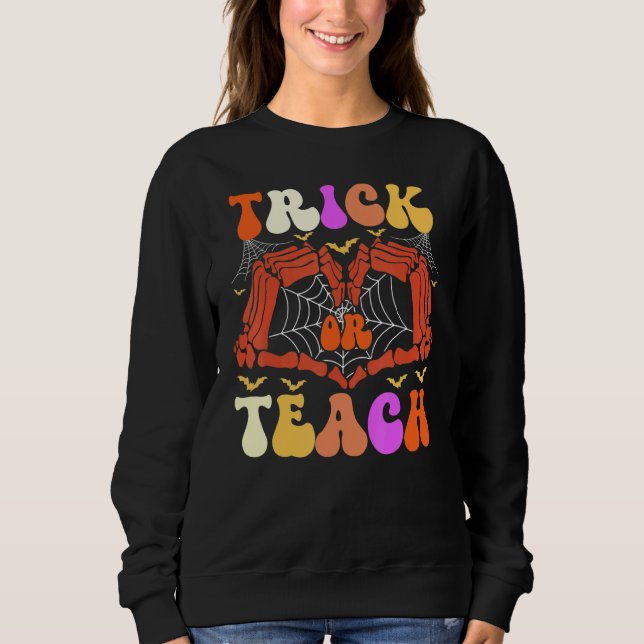 Retro Trick Or Teach Skeleton Hand Teacher Hallowe Sweatshirt (Front)