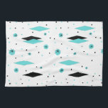 Retro Turquoise Diamond & Starburst Kitchen Towel<br><div class="desc">This Retro Turquoise Diamonds and Starbursts Kitchen Towel is a new take on a vintage style. It features kitschy, black starbursts on turquoise polka dots, surrounding geometric, turquoise and black diamond shapes. Customise the background colour on this mid century modern product if you're feeling daring, or leave it white if...</div>