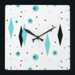 Retro Turquoise Diamonds & Starbursts Wall Clock<br><div class="desc">This Retro Turquoise Diamonds and Starbursts Acrylic Wall Clock is a new take on a vintage style. It features kitschy, black starbursts on turquoise polka dots, surrounding geometric, turquoise and black diamond shapes. Customise the background colour on this mid century modern product if you're feeling daring, or leave it white...</div>