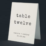 Retro Typewriter Ivory Custom Wedding Number<br><div class="desc">This table number tent features an ivory background with bold typewriter-style typography for a clean, modern reception look. The folded, freestanding format makes it easy for guests to find their table at a glance. Fully customizable with your table number, names, and wedding date to coordinate seamlessly with a minimalist or...</div>