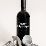 Retro Typography Black Merry Christmas Wine Label<br><div class="desc">Add a festive touch to your wine bottles this holiday season with custom holiday wine labels. The holiday wine labels display "Merry Christmas" in a white, retro font style with a black background (or colour of your choice). Personalise the Christmas wine labels by adding your name, business name, or other...</div>