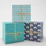 Retro Video Game Theme Personalised Birthday Wrapping Paper Sheet<br><div class="desc">Designed to match our Level Up birthday party invitations and accessories, this retro gamer themed wrapping paper set features three patterns: a turquoise blue background with a pattern of vintage video game controllers and handheld consoles, a game controller on a navy blue background with "[Name] has reached level [age]", and...</div>
