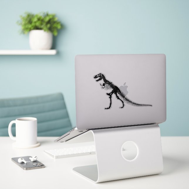 Retro Whimsy: Dinosaur Fossil Funny Clipart (Laptop On Desk)