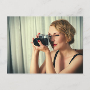 Retro woman with camera postcard
