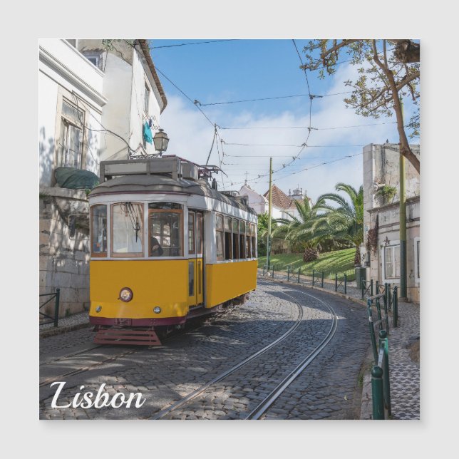 Retro yellow tram on street in Lisbon, Portugal (Front)