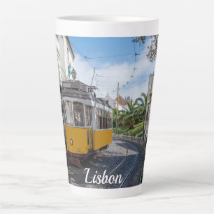 Retro yellow tram on street in Lisbon, Portugal Latte Mug