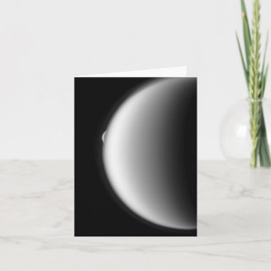 Rhea Emerges from Titan Note Card
