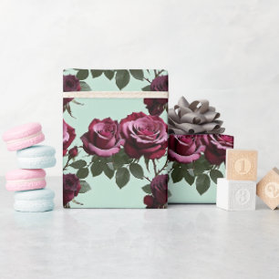 Rich Purple And Deep Red Roses On A Mint Green Wrapping Paper