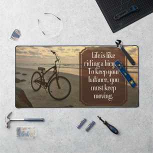 "Riding a bicycle" Inspirational Quote Desk Mat