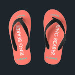 Ring Bearer NAME Coral Kid's Thongs<br><div class="desc">Ring Bearer is written in white text against bright coral colour with black accents. Name and Date of Wedding is turquoise blue. Personalise your little ring bear boy's name in arched uppercase letters. Click Customise to increase or decrease name size to fall within safe lines. Fun beach destination flip flops...</div>