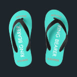 Ring Bearer NAME Turquoise Blue Kid's Thongs<br><div class="desc">Ring Bearer is written in white text against bright happy turquoise blue colour with black accents. Name and Date of Wedding is in coral text. Personalise your little ring bear boy's name in arched uppercase letters. Click Customise to increase or decrease name size to fall within safe lines. Fun beach...</div>