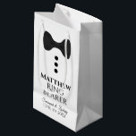Ring Bearer Wedding Gift Bag with Black Tie Small<br><div class="desc">This gift bag is designed for your Ring Bearer. The design features black text and a black tie with buttons on a white background. Includes a space for his name as well as the name of the couple and the wedding date. Fill with gifts, favours, candy, booze, or any other...</div>