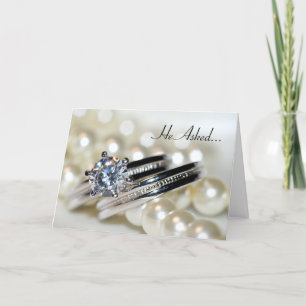 Rings and White Pearls Engagement Announcement