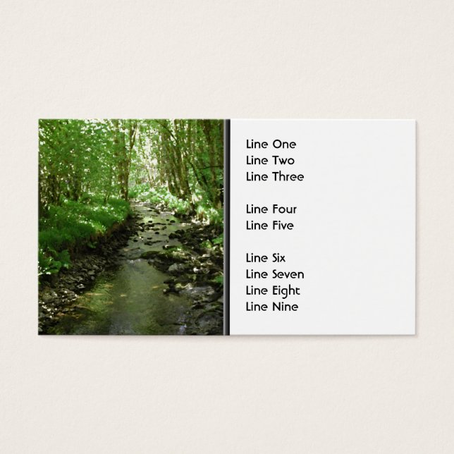 River flowing through woodland. (Front)