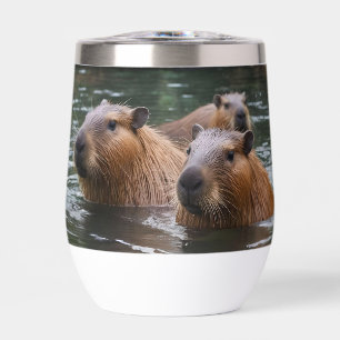 "River Serenity: Capybaras Swimming in the Flow"