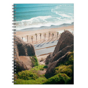 Road near seashore notebook