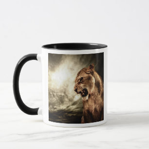 Roaring lioness against stormy sky mug