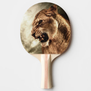 Roaring lioness against stormy sky ping pong paddle