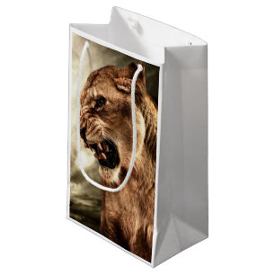 Roaring lioness against stormy sky small gift bag