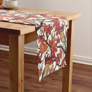 Robins in maple tree on off white short table runner