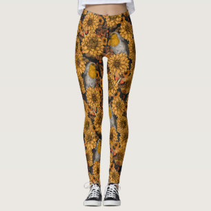 Robins in the autumn garden on black leggings