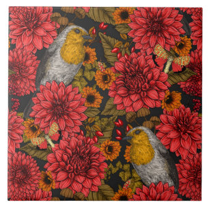 Robins in the autumn garden, red dahlias on black ceramic tile