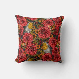 Robins in the autumn garden, red dahlias on black cushion